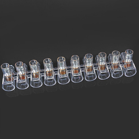 A strip of 10 transparent 6 mm² screw terminal blocks.